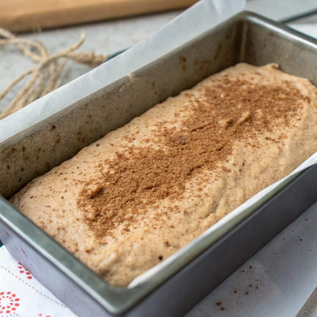 Caramel Churro Protein Bar Recipe – Soft, Sweet & High in Protein 8 caramel churro protein dough pressed in pan