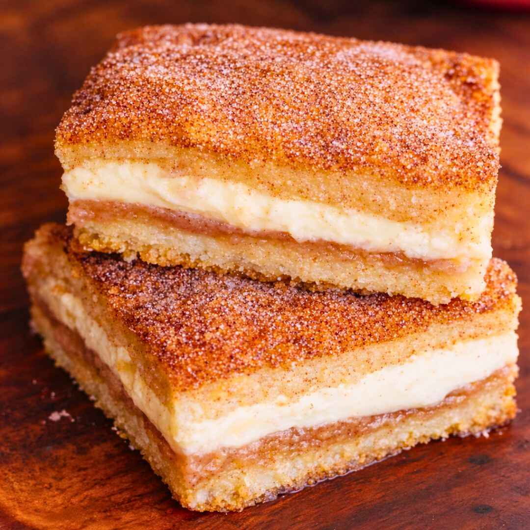 Churro Cheesecake Bars That Melt in Your Mouth 3 Churro Cheesecake Bars