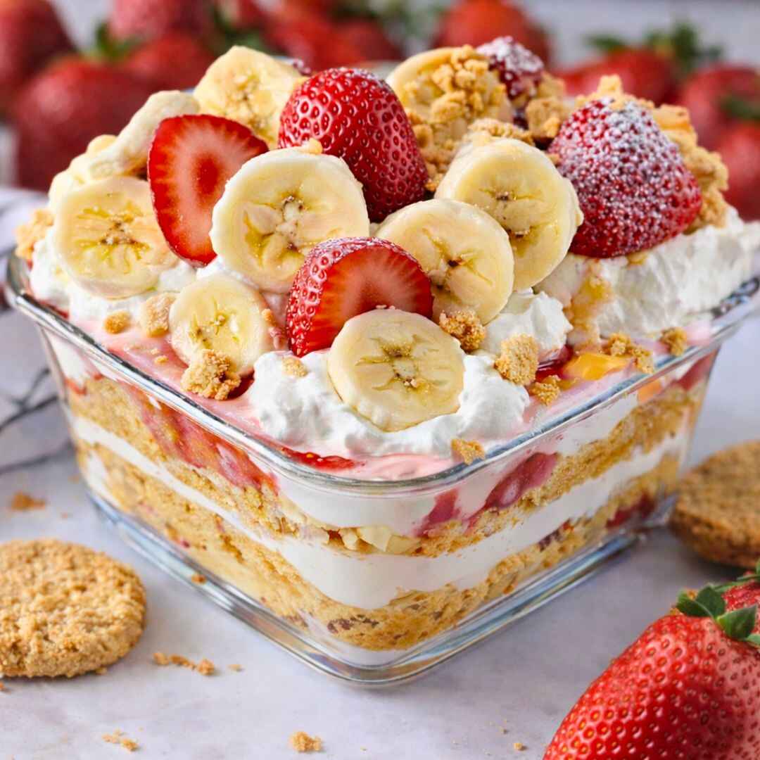 Strawberry cheesecake banana pudding in glass dish