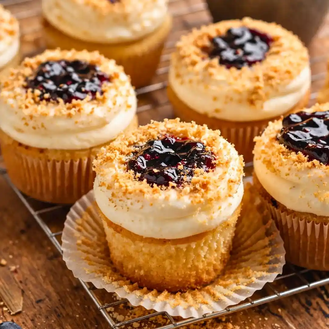 Blueberry Cheesecake Cupcakes 5 Blueberry Cheesecake Cupcakes (Soft Vanilla Cupcakes with Berry Filling)